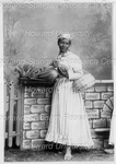 Woman Standing Holding a Fruit Tray and a basket