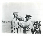 Benjamin O. Davis, Sr. Pins the Distinguished Flying Cross on his son