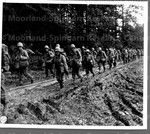 Japanese American Infantry men hike