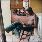Willie Causey, Jr., with Gun During Violence in Alabama, Shady Grove, Alabama, 1956 by Gordon Parks