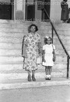 Woman and child pictured on church steps by Harold Hargis