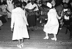 2 women dancing in the aIsle at the United House of Prayer For All People Church by Harold Hargis