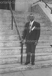 Unidentied man with suit pictured on church steps by Harold Hargis