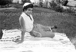 Unidentified Women posed laying on a blanket - 2 by Harold Hargis