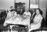 People Shown at a Dining Table by Harold Hargis