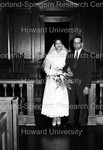 Bride and older male standing in the aisle by Harold Hargis