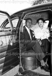 Bride and Groom in the car; after the wedding by Harold Hargis