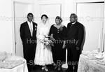 Bride and Groom with 2 unidentified people by Harold Hargis