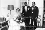 Bride and Groom with 2 unidentified people; 1 seated - 2 by Harold Hargis