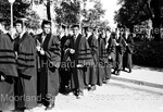 Men Lined Up After Graduation - 1 by Harold Hargis