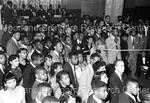 Large group of onlookers and band at Homecoming Dance by Hargis Harold