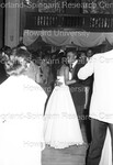 Homecoming Queen dancing with unidentified male by Hargis Harold