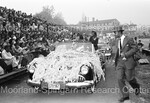 A car decorated in streamers for the homecoming parade by Harold Hargis