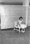 Woman Photographed in a Chair - 2 by Harold Hargis