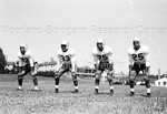 Howard University Football Players Posing while on the Field - 33 by Harold Hargis