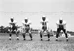 Howard University Football Players Posing while on the Field - 34 by Harold Hargis