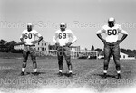 Howard University Football Players Posing while on the Field - 36 by Harold Hargis