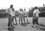 Howard University Football Players Posing while on the Field - 40 by Harold Hargis