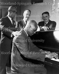 President Mays Seated at Piano