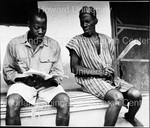 Liberia Young 'Man" reading