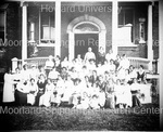 Unidentified group in front of building