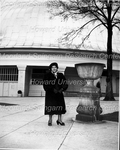 Hazel Harrison in Paris Standing in Front of Domed Building Beside Urn
