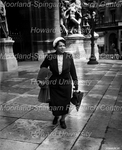 Hazel Harrison in Paris Carrying Umbrella and Coat