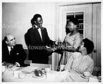 Osborne T. Smallwood Presenting Cup to Girl