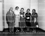 Roberta Harlan (center) and Lillian Blake (second from right) receive cash awards