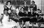 Women - Dr. Grace Holloman Davis, daughter of Rev. Dr. John L. S. Holloman [pastor of Second Baptist Church 1917-1970] (standing, far left) with Unidentified Women's Group