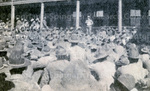 Soldiers gathering to listen to a speaker